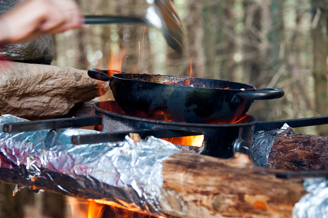 Cooking dinner on campfire